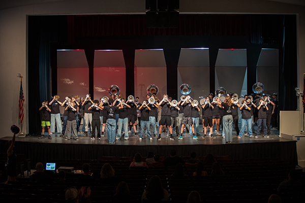 The RUHS band performs on stage
